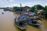 The small but historic town of  Hoi An is located on the Thu Bon River 30km (18 miles) south of Danang. During the time of the Nguyen Lords (1558 - 1777) and even under the first Nguyen Emperors, Hoi An - then known as Faifo - was an important port, visited regularly by shipping from Europe and all over the East.<br/><br/>

By the late 19th Century the silting up of the Thu Bon River and the development of nearby Danang had combined to make Hoi An into a backwater. This obscurity saved the town from serious fighting during the wars with France and the USA, so that at the time of reunification in 1975 it was a forgotten and impoverished fishing port lost in a time warp.