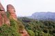 Danxia Mountain (丹霞山) meaning Red Rosy Clouds Mountain, is a famous scenic area near Shaoguan city in the northern part of Guangdong Province. The area is formed from a reddish sandstone which has been eroded over time into a series of mountains surrounded by curvaceous cliffs and many unusual rock formations (Danxia Landform).<br/><br/>

There are a number of temples located on the mountains and many scenic walks . There is also a river winding through the mountains on which boat trips can be taken to enjoy the scenery.<br/><br/>

Particularly noted are two formations: a stone pillar called the Yangyuan (male/father stone) that bears a resemblance to a phallus and the Yinyuan hole, which somewhat resembles labia.